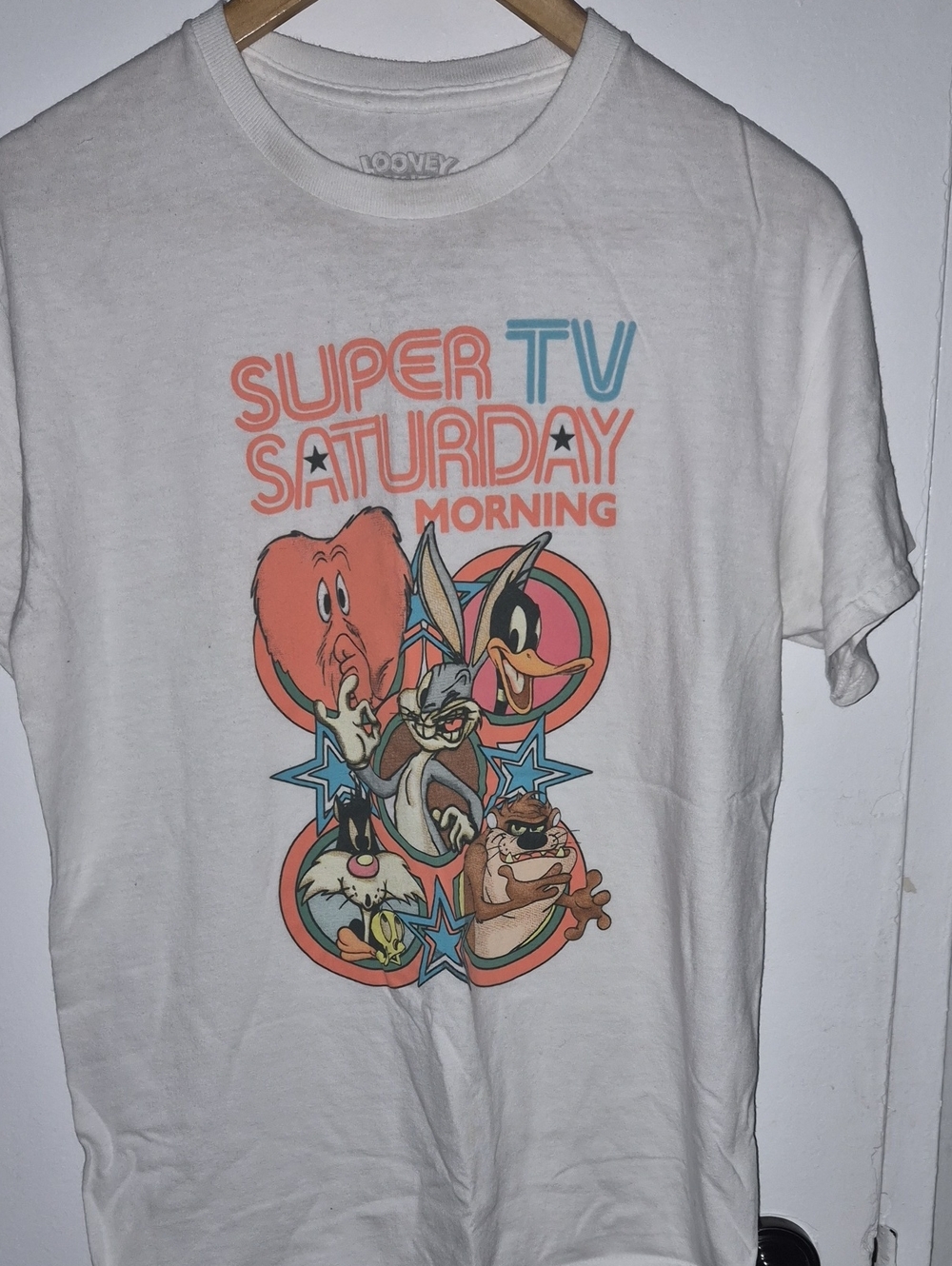Vintage Warner Bros. White Tee with Orange and Blue Retro Cartoon Graphic